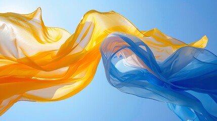 Vibrant yellow and blue banner waving against a clear blue sky in a stunning outdoor scene