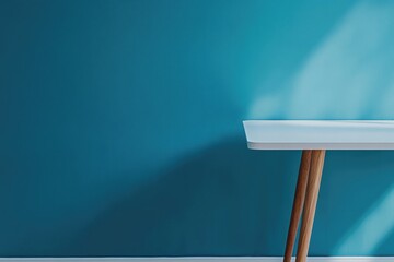 Aufkleber - Simple table with wooden legs on a blue background, ideal for office or home use