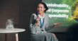 © KayExam/peopleimages.com - Woman, stage and smile at conference for sustainable ideas and responsible corporate decisions as public speaker. Female person, screen and global networking, seminar and summit in auditorium