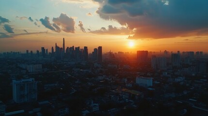 Poster - Sunset Over Urban Skyline with Dramatic Clouds