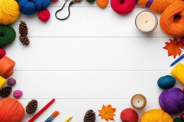 Poster - White background with a colorful border of yarn and other craft supplies. candle is in the middle of the border. white wood background with crafting supplies coming in around the edges: yarn, candles