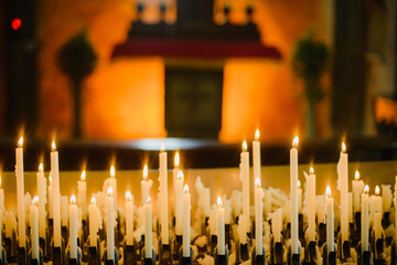 burning candles in church