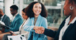 © KayExam/peopleimages.com - Happy, business and women with handshake for interview, candidates introduction and recruitment welcome. Smile, people and finance documents for hiring, agreement and opportunity deal of b2b process