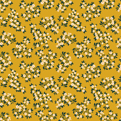 Wall Mural - Retro floral pattern in small decorative flowers. Small white flowers. Gold yellow background. Ditsy print. Floral seamless background ditsy pattern in small cute wild flowers.