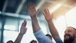 © BoOm - Individuals enthusiastically raising hands during an engaging event or discussion.