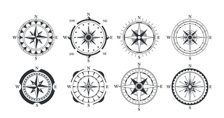 collection of vintage compass designs featuring directional arrows pointing north, south, east and w