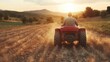 © familymedia - A farmer driving a tractor through a golden field during sunset, depicting agricultural life and hard work amid the serene beauty of the countryside scenery.