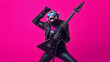 © Hashim - A capuchin monkey wearing leather pants, a studded jacket, and holding an electric guitar against a hot pink background.