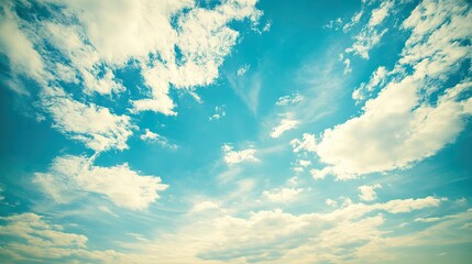 Wall Mural - white fluffy clouds form a natural border against a blue sky, with a clear space in the middle for c