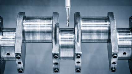 Poster - crankshaft after repair rotates on the stand and is tested by the CMM coordinate measure machine, service industry concept