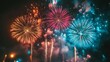 © Joachim - An explosive display of colorful fireworks lighting up the night sky with vibrant hues of red, blue, and gold, creating a festive atmosphere for celebration.