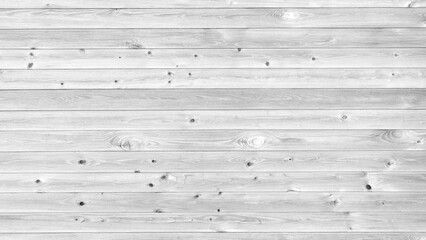 Poster - A wooden wall with a grainy texture. The wood is gray and has a natural look. The wall is empty and has no furniture or decorations