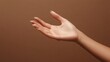 © Johannes - Close up of woman hand with palm facing upwards isolated on brown background. Female hand showing empty hand. Woman holding your beauty product