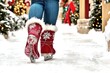 © Konstiantyn Zapylaie - Winter walking scene with ice skating shoes on a snowy holiday street