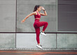 © KayExam/peopleimages.com - Exercise, profile and stretching with woman in city, outdoor for cardio, training or workout routine. Fitness, running and warm up with sports person in urban town for challenge and competition