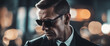© FrameFinesse - Secret agent spy person classic spy movie stylish action clothes scene noir movie handsome macho man with black sunglasses portrait