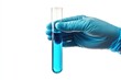 © iridescentstreet - A laboratory technician conducts an experiment by mixing blue liquid in a test tube while wearing protective gloves in a lab