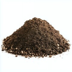 Closeup of rich, dark soil with white fertilizer pellets isolated on white background.