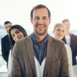 © peopleimages.com - Smile, technology and portrait of business people in office with manager for project advice or feedback. Happy, collaboration and public relations team with mentor for review on global client report.
