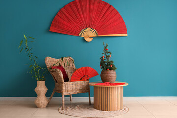 Wall Mural - Interior of living room decorated for Japanese New Year celebration with armchair and fir tree