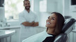© kora studio - the beautiful smile woman is on the dentist chair ready to have teeth cleaning