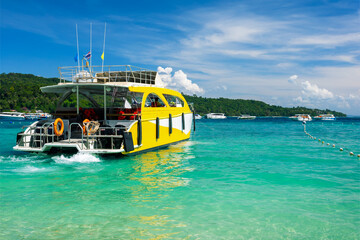 Wall Mural - Beautiful view of speed boats on Ko Phi Phi Don, Thailand. Travel, vacation, holiday on  Phi Phi Don island, Andaman sea.