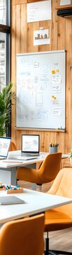 Modern Office Workspace with Whiteboard and Laptops.