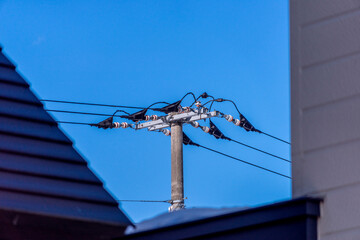 Wall Mural - Power pole and cables at downtown of Biei-cho near Hokkaido, Japan