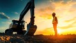 © MAHLUFI_ - Construction worker at sunset with excavator
