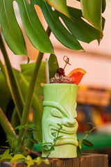 Wall Mural - A cocktail in a tiki style glass