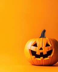 Wall Mural - halloween pumpkin decoration with carved jack o lantern on orange backdrop and ample copy space