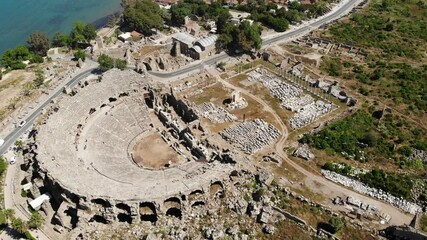 Wall Mural - Scenic aerial view of partially restored antique Roman theater in ancient city of Side on Mediterranean coast in Antalya province on sunny spring day, Turkey