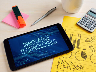 Businessman analyzing innovative technologies using digital tablet