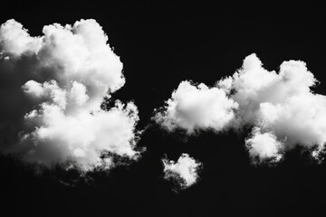 Aufkleber - Striking black and white image showcasing the beauty and mystery of fluffy clouds, highlighting their textures and contrasts against the dark backdrop of the sky.