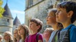 © Oulaphone - A group of children gazes in wonder, standing outside a historic building, illuminated by bright sunlight.