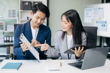 Business team present. professional investor working new start up project. Finance managers meeting.using smart phone and laptop and digital tablet computer in modern office.