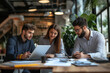 © N. W. - business professionals working on a project as a team in the office for work to show teamwork