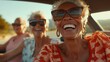 © Uliana - A group of elderly friends taking a road trip together, laughing and enjoying the journey