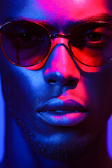 Poster - A man wearing a pair of red and blue glasses