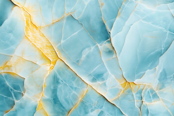 Close-up of blue and yellow marble texture with intricate veining and natural patterns, ideal for backgrounds or interior design elements.