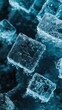 © Sasa Visual - Glittering ice cubes rest on a dark surface, showcasing detailed frozen textures and cool colors