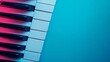 © BajimBa - An overhead view of a piano keyboard with vibrant lighting on a colorful background during a music session
