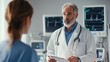© Sasa Visual - A doctor discusses patient care and medical procedures with a nurse in a hospital setting