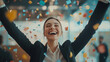 © Ruslan - Happy businesswoman celebrating success or victory in office with falling confetti