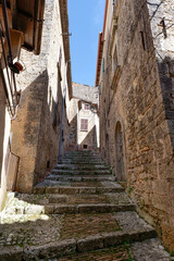 Canvas Print - A street between the old houses of Casalvieri in Lazio, Italy.