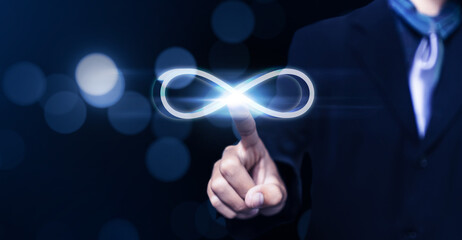 Leinwandbilder - Businessman hand infinity symbol connection dots data technology, future limited to unlimited infinite sign resource power supply internet information usage vector illustration blue background