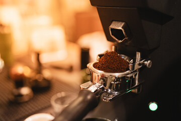 In vibrant cafes, the barista skillfully operated the machine, grinding fresh beans to create a perfectly grated espresso, crafting a hot drink that delighted every customer.