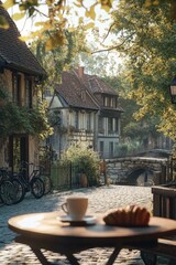 Poster - A cozy setup with a cup of coffee and a few decorative items on a small table.