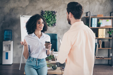 Poster - Portrait of two young corporate workers communicate modern loft interior office indoors