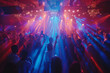 © dvoevnore - Crowd dancing under colorful lights at a lively party or concert